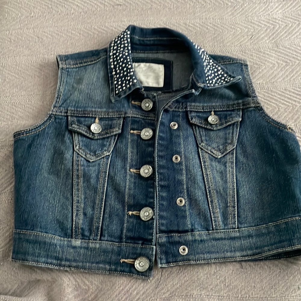 Justice denim vest with rhinestone collar.